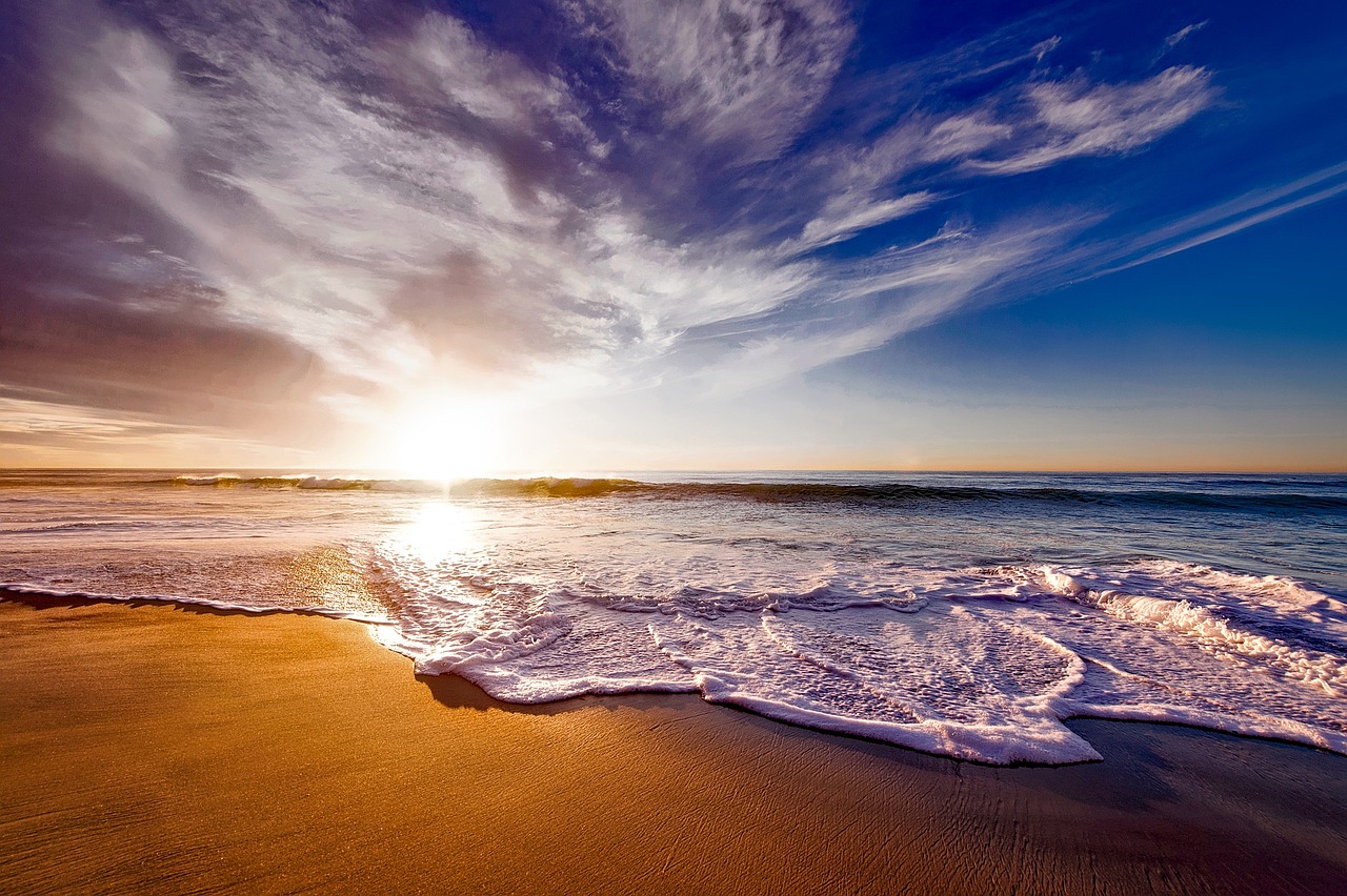 Sunshine over California coast beach - afinestpm.com.