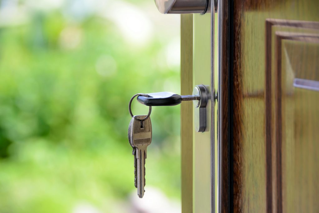 House key of lock in an open door - Visit afinestpm.com. 