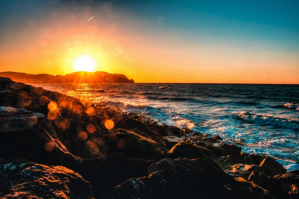 Rocky seashore at sunset - visit afinestpm.com.